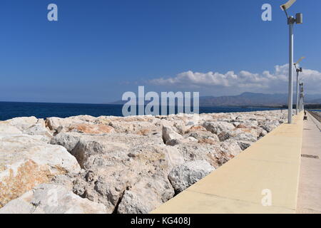 The harbour wall at the picturesque Latchi Harbour marina near Polis Chrysochou in the Paphos district of Cyprus. Stock Photo