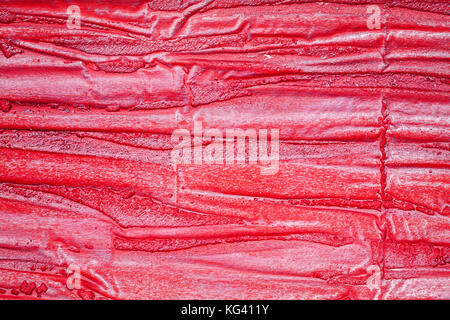Red bumpy wall stucco texture background, crumpled leather imitation Stock Photo