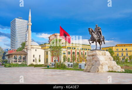 Statue of Skanderbeg, Ethem Bey Mosque and City Hall, Skanderbeg Square, Tirana, Albania Stock Photo