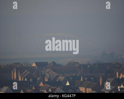 Isle of Sheppey, Kent, UK. 3rd Nov, 2017. UK Weather: the A249 Sheppey Crossing covered in thick fog/mist as seen from Minster on sea. In 2013, a crash on the crossing in thick fog turned into Britain's biggest road accident, involving 130 vehicles. Credit: James Bell/Alamy Live News Stock Photo