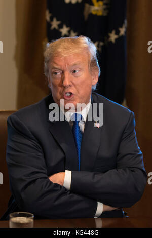 Washington, USA. 02nd Nov, 2017. President of the United States Donald J Trump speaks with reporters about his proposed tax reform plan in the cabinet room during a meeting with congressional republicans at the White House in Washington, DC on November 2nd, 2017. Credit: Alex Edelman/CNP - NO WIRE SERVICE - Credit: Alex Edelman/Consolidated/dpa/Alamy Live News Stock Photo