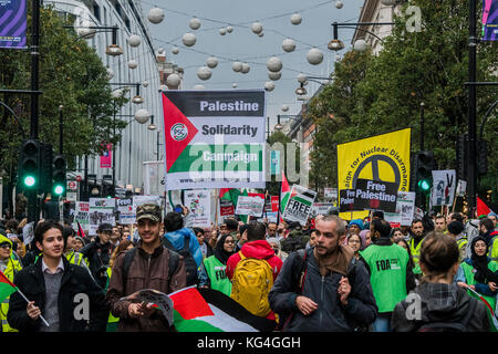 London, UK. 04th Nov, 2017. Marching down Oxford Street - National Palestine March and Rally - Justice Now: Make it right for Palestine. As the centenary of the Balfour Declaration has just passed on the 2nd November. Speakers addressed the crowd at Grosvenor Square (by the US Embassy) before the march through central London (via Piccadilly Circus and Trafalgar Square). This was followed by a rally in Parliament Square, where speakers again addressed the crowd. Credit: Guy Bell/Alamy Live News Stock Photo