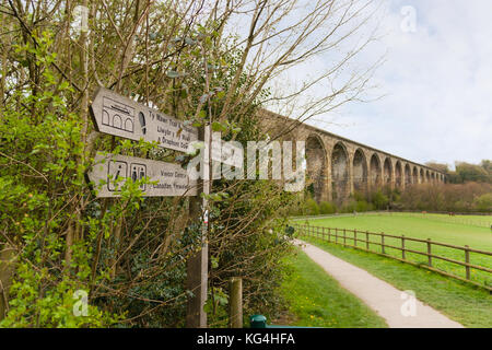 Ty Mawr Country Park in Cefn Mawr Wrexham North Wales with a trail sign pointing to the railway viaduct and walking trails Stock Photo