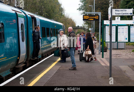 Passengers about to board an Arriva Trains Wales class 175 diesel train at Church Stretton station, Shropshire, England, UK Stock Photo