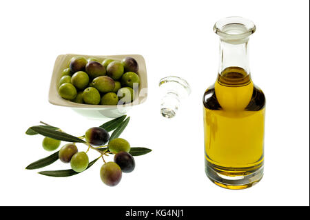 Bowl of olives and extra virgin olive oil in a glass cruet isolated on white background Stock Photo