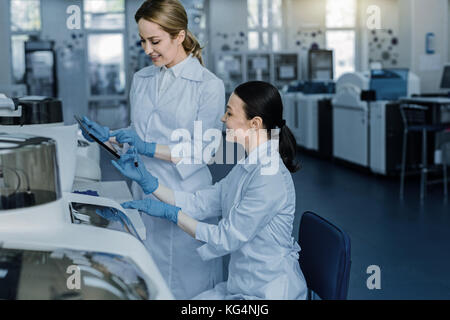 Happy nice women talking to each other Stock Photo