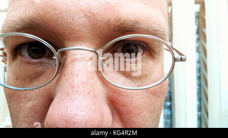 Face of a man wearing glasses Stock Photo