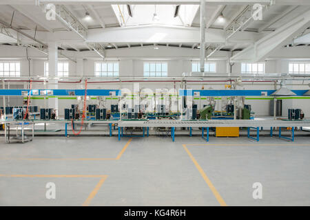factory floor for production and assembly of household air conditioners on the conveyor belt Stock Photo