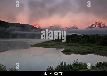 WY02546-00...WYOMING - Sunrise over Mount Moran and the Teton Range from the Oxbow Bend Turnout on the Snake River in Grand Teton National Park. Stock Photo