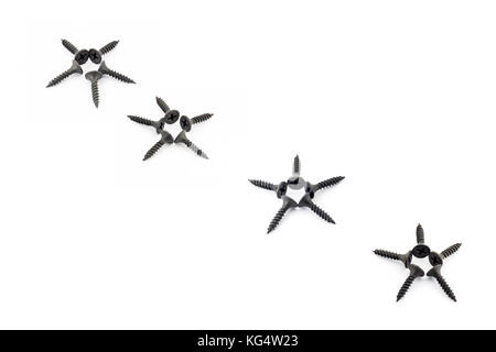 Five-pointed stars lined diagonally with Oxidized self-tapping screw isolated on white background Stock Photo