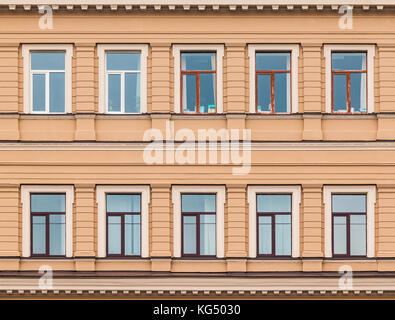 Several windows in a row on facade of urban office building front view, St. Petersburg, Russia Stock Photo