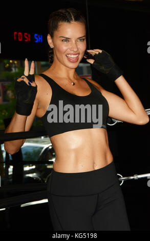 Adriana Lima promotes 'Train Like a Victoria's Secret Angel' fitness