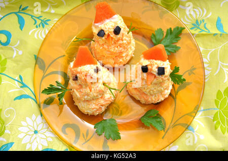 Three eatable snowman figures. Funny Christmas meal for kids. Top view. Stock Photo