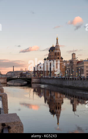 Resurrection Church at the Warsaw station is reflected in water of Obvodny canal, St. Petersburg, Russia Stock Photo