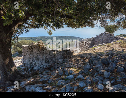 Ruins of houses destroyed in the 1953 Ionian earthquake in the mountain village of Anogi on Mount Nirito - Ithaka Greece Stock Photo