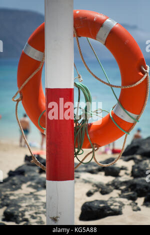 buoy on the beach. sea in the background Stock Photo