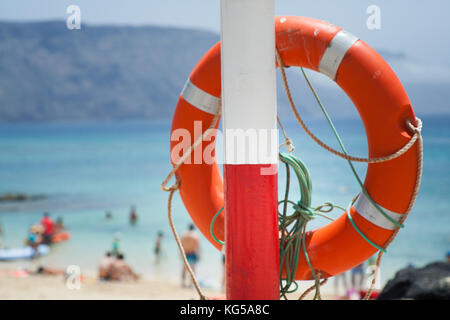 buoy on the beach. sea in the background Stock Photo