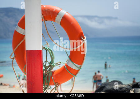 buoy on the beach. sea in the background Stock Photo