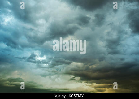 Dark sky with black clouds brings storm rain Stock Photo - Alamy