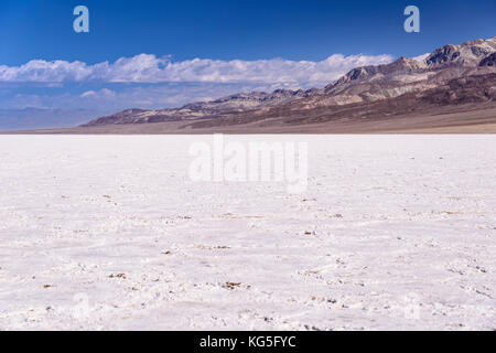 The USA, California, Death Valley National Park, Badwater Basin, salt pans with Badwater against Amargosa Range