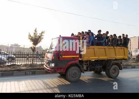 Kathmandu, Bagmati area, Nepal Truck carries people on the streets of Kathmandu Stock Photo