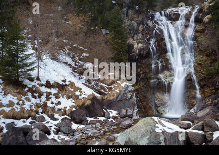 Winter view of Vo' waterfall near Schilpario, Val di Scalve, Bergamo province, Lombardy, Italy. Stock Photo