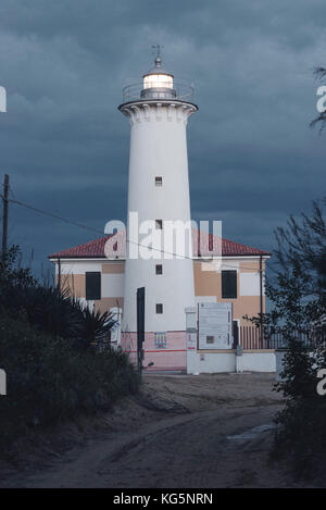 Bibione, District of Venice, Veneto, Italy. The Lighthouse of Bibione at dusk. Stock Photo