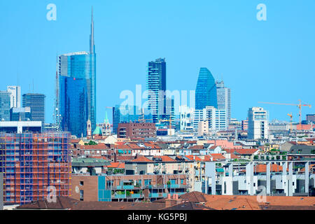 Milan, Italy, the new skyline with Porta Nuova and Citylife skyscrapers, view from Monte Stella park, on summer 2017 Stock Photo