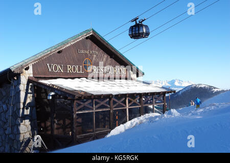 Jasna, Slovakia -  January 23, 2017: View of modern restaurant on ski slope in the resort Jasna, Low Tatras, Slovakia. Stock Photo