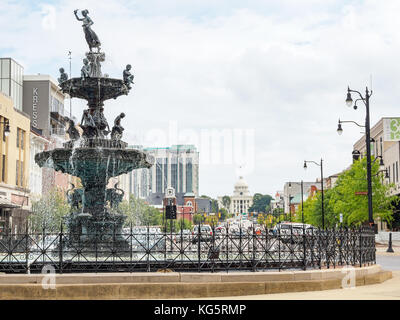 Beautiful Court Square fountain built in the late 1800's with the Alabama State Capital Building in the background.  Montgomery Alabama USA. Stock Photo