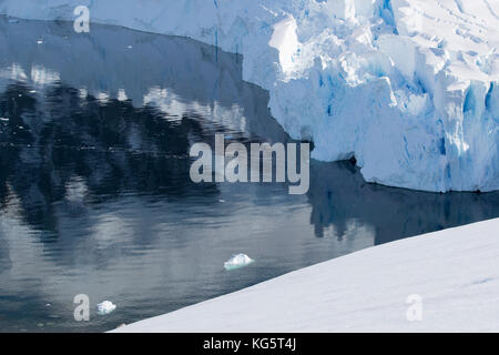 Glacier and water reflections, Antarctic Peninsular Stock Photo