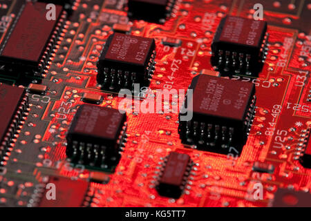 computer mainboard - dual inline modules, surface mounted devices with green, red, blue light - macro shot
