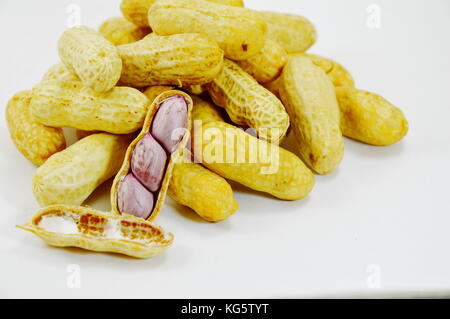 boiled peanuts peel out on white background Stock Photo