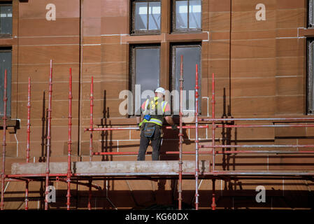 queen street station glasgow renovation scaffolding scaffolders workers hard hats Stock Photo