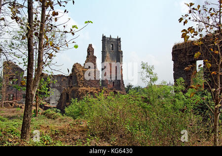 Ruins of belfry of the Church of St Augustine and monastery in Old Goa, India. Built by Augustinian friars in 1602 and abandoned in 1835 Stock Photo