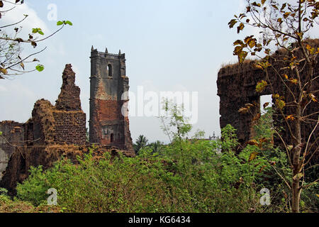 Remains of bell tower of the Church of St Augustine and other structures of the monastery in Old Goa, India. Built in 1602 by Augustinian friars Stock Photo