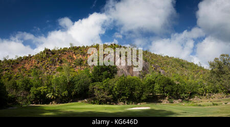 The Seychelles, Praslin, Anse Kerlan, Miller mountain above Constance Lemuria Resort golf course Stock Photo