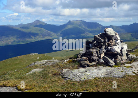 Munros Ben Vorlich & Stuc a' Chroin from the Pile of Stones on the Summit of the Scottish Mountain Corbett Meall an t-Seallaidh,Scottish Highlands. Stock Photo