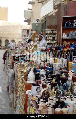 DOHA, QATAR - OCTOBER 23, 2017: Souvenirs on sale at a shop in Souq Waqif, Doha. Stock Photo