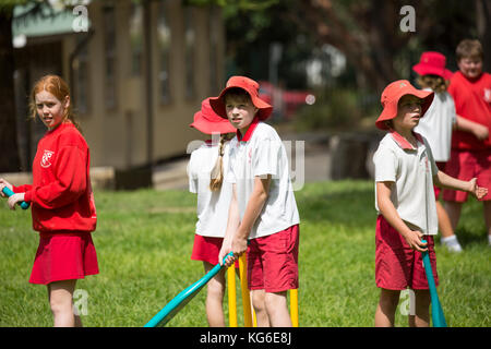Australian schools children playing cricket sport at school,Sydney,Australia Stock Photo