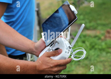 Remote control drone in the hands of man Stock Photo