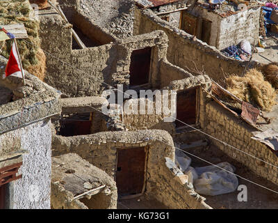 Tibetan village, labyrinth walls of clay brick, brown doors in the walls, the Himalayas, Northern India. Stock Photo