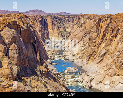 The Orange River Gorge below the waterfall in the Augrabies Falls National Park in the Northern Cape of South Africa. Stock Photo