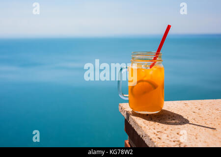Fresh juices with fruits on wooden table Stock Photo