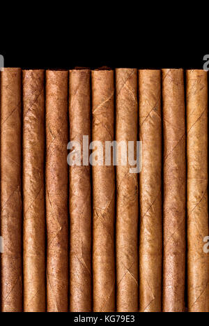 Cigars on black table, top view Stock Photo