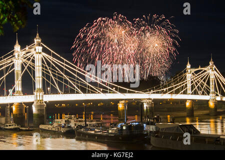 The Battersea Park fireworks over Albert Bridge, in London. Stock Photo