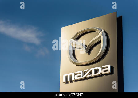 Northampton, UK - Oct 25, 2017: Day view of Mazda logo at Riverside Retail Park. Stock Photo