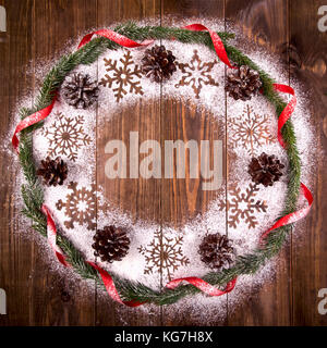 Christmas Wreath, Holiday Composition on a Wooden Background. Top View Stock Photo