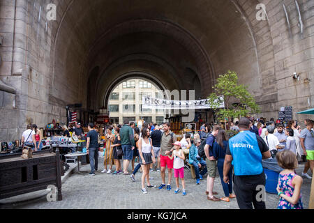 Unindentified people at Brooklyn Flea market in New York. Brooklyn Flea is one of New Yorks top flea markets. Stock Photo