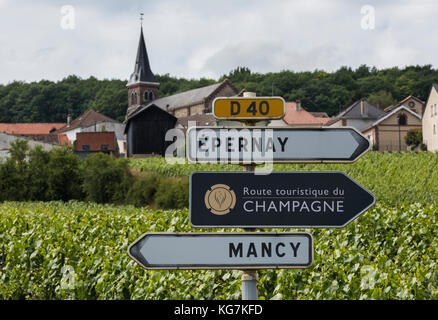 Epernay, France - June 11, 2017: Sign of the Route Touristique du Champagne with in the background vineyards of the Champagne district Vallee de Marne Stock Photo